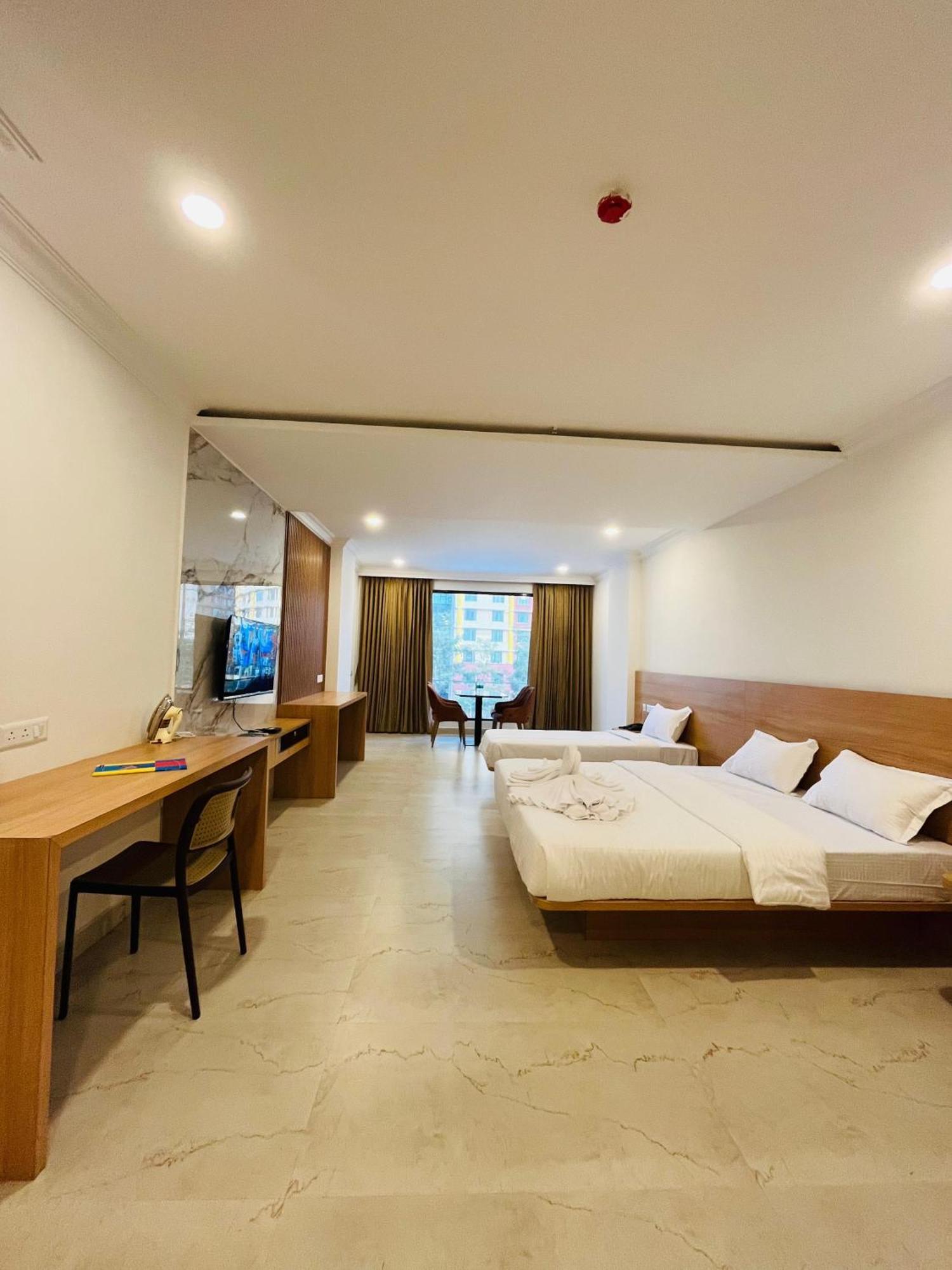 Richmond Inn And Suites Manipal Quarto foto